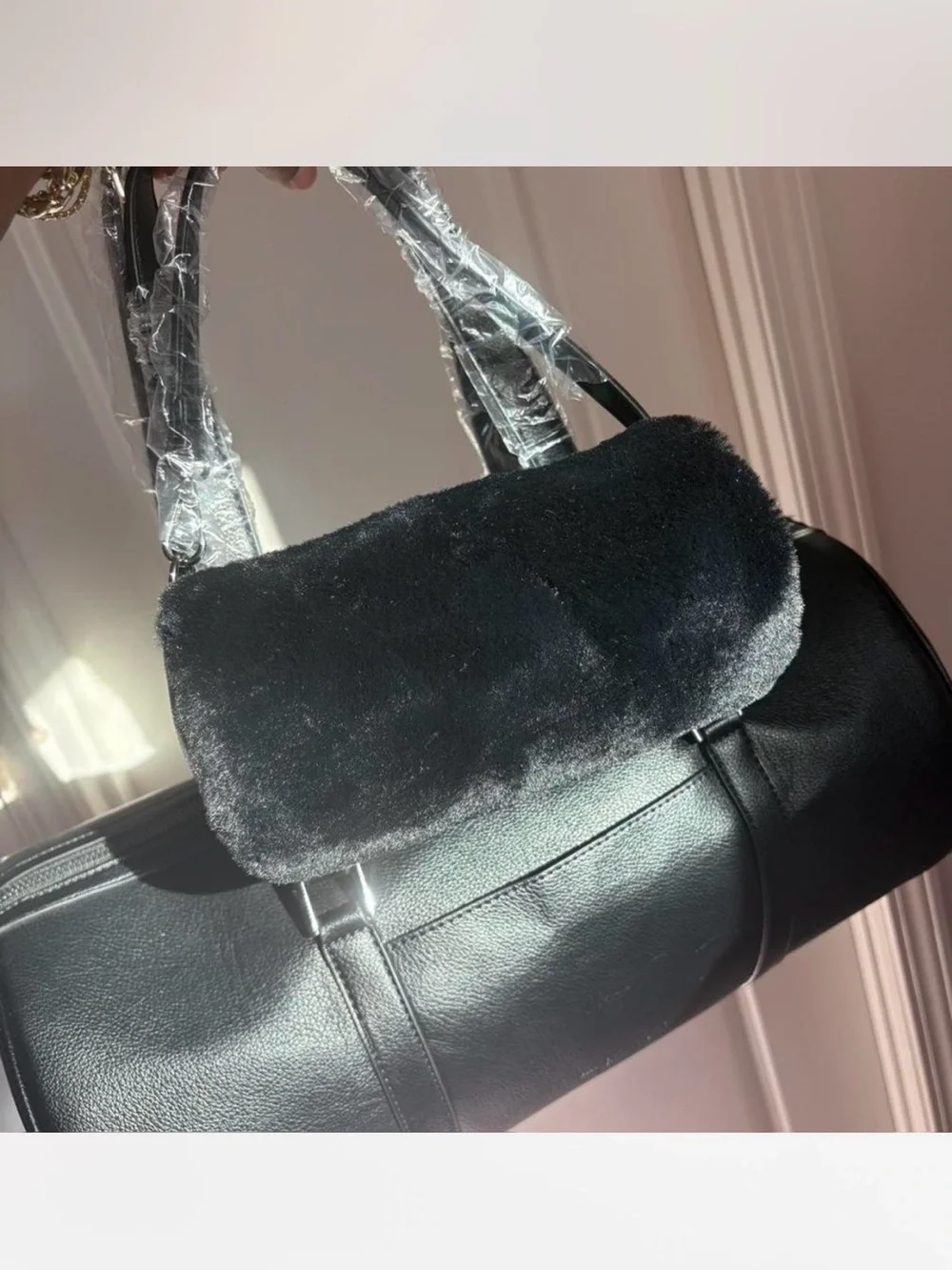 Black travel or over night bag and matching purse